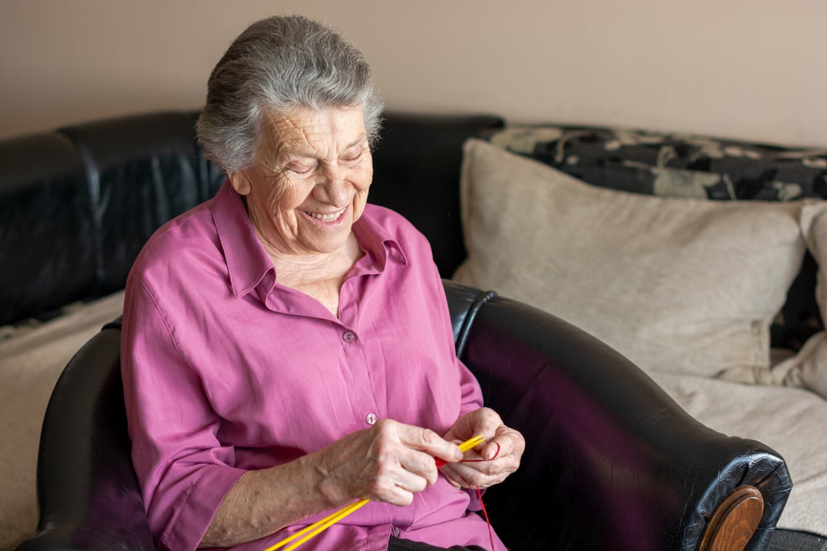 An old women knitting.